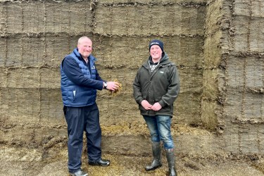 Harry Johnson and Chris Wood stood with silage clamp